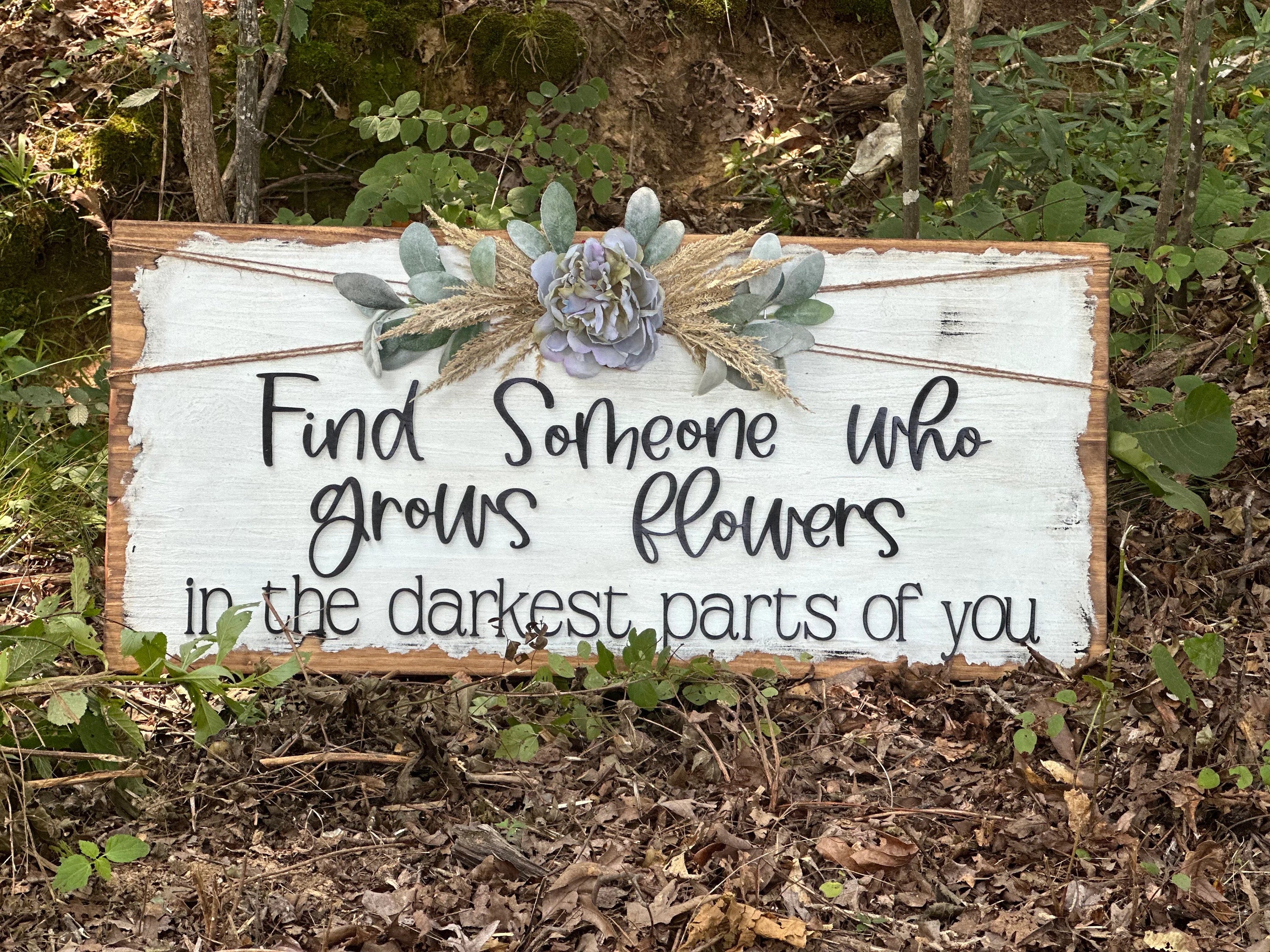 Someone who Grows Flowers sign