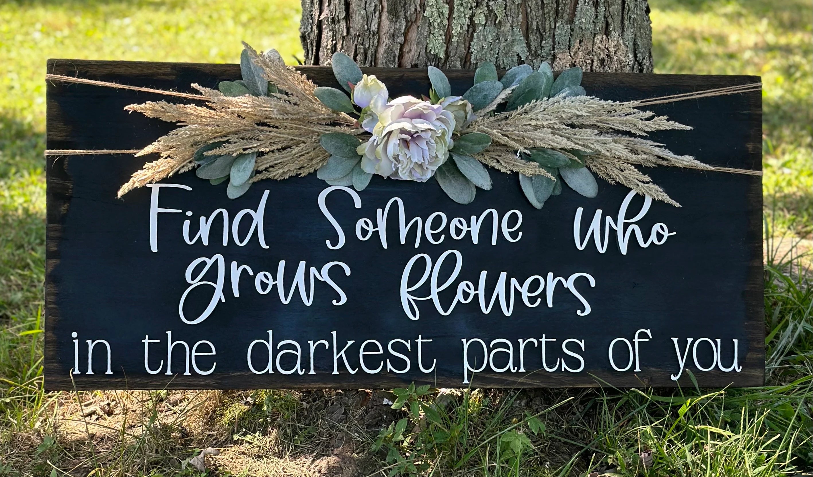 Someone who Grows Flowers sign