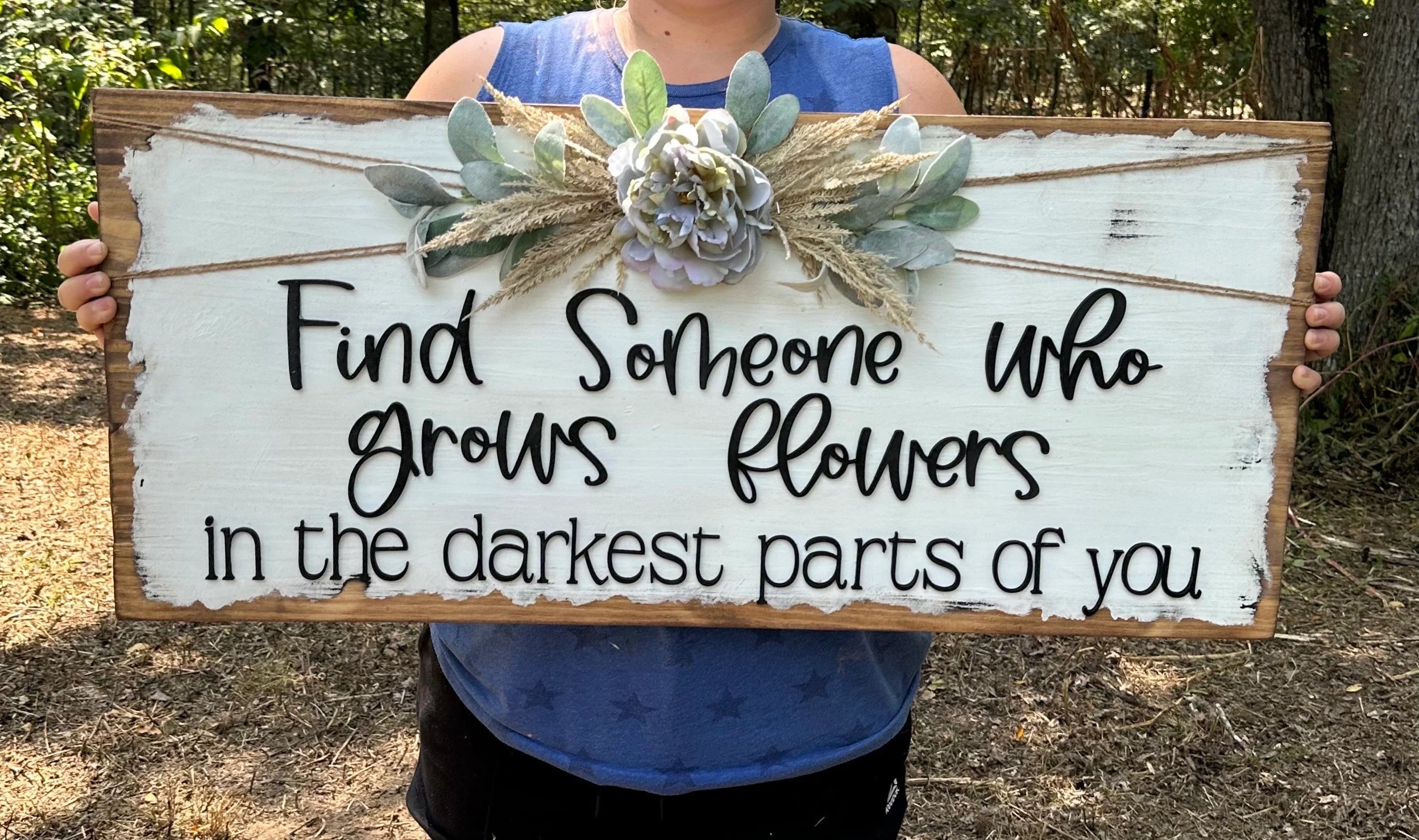 Someone who Grows Flowers sign