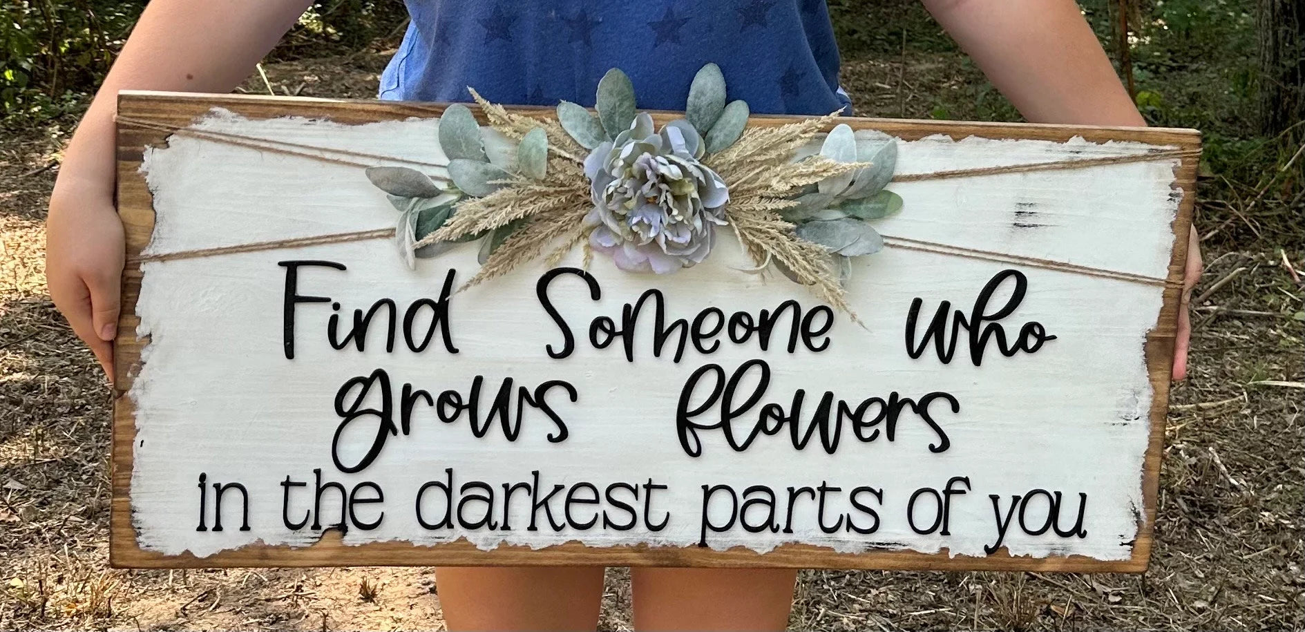Someone who Grows Flowers sign