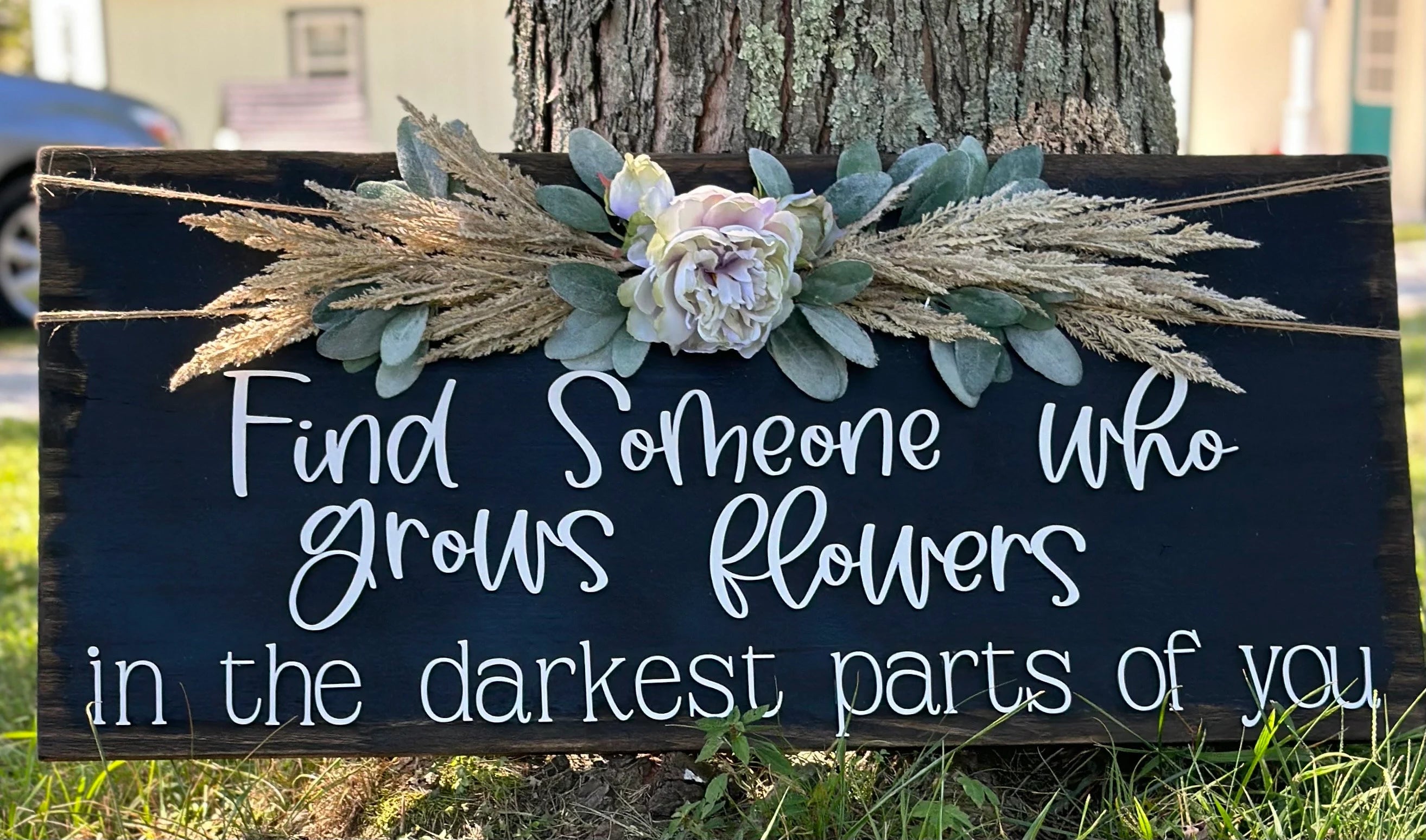 Someone who Grows Flowers sign