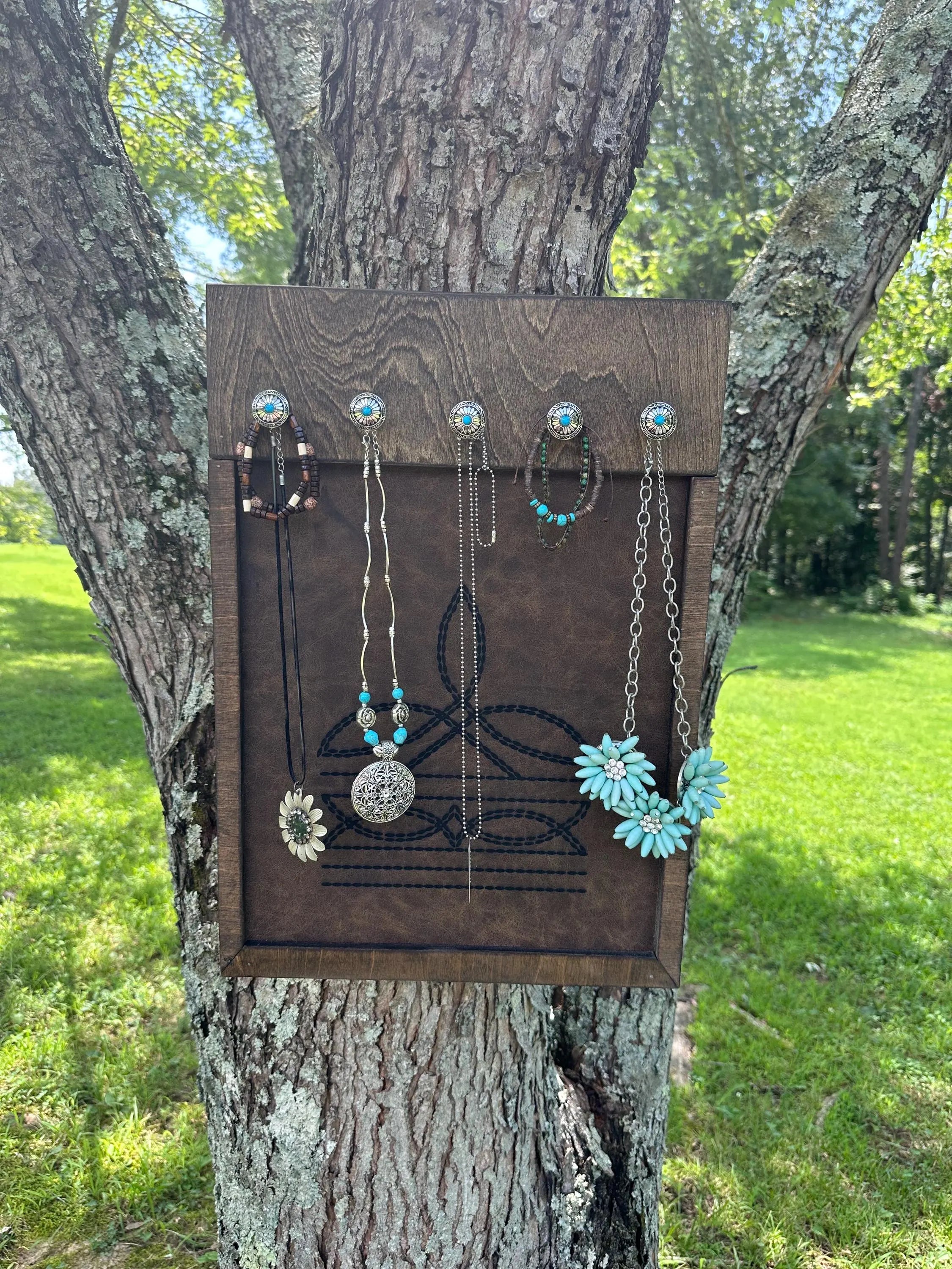 Western jewelry holder with Conchos